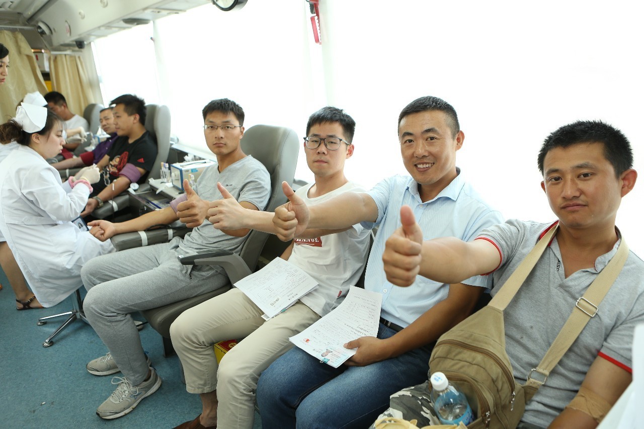 闵行区：他们的热血真情比盛夏更热